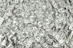 Giant pile of us dollar bills money